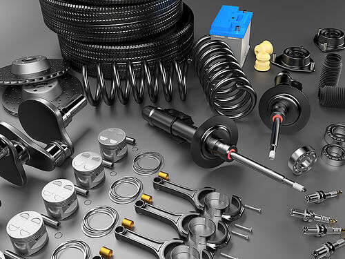 Auto parts spare parts car on the grey background. Set with many new items for shop or aftermarket. Auto parts for car. 3D rendering Auto parts spare parts car on the grey background. Set with many new items for shop or aftermarket. Auto parts for car. 3D rendering